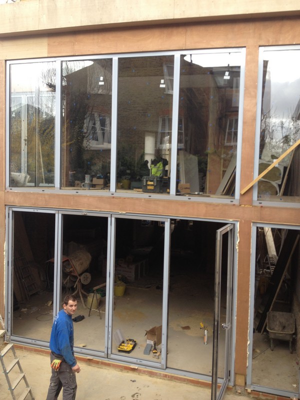 Aluminium bi-fold doors with two-storey glazing in Elephant & Castle
